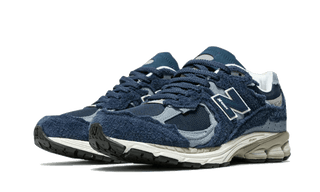 New Balance 2002R Protection Pack Navy - SneakCenter